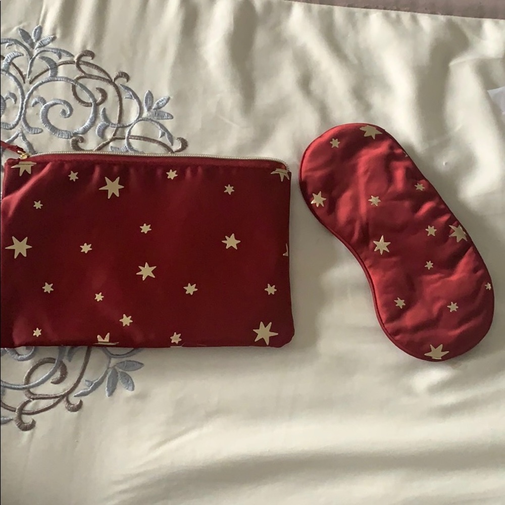 Estée Lauder cosmetics bag and sleep mask